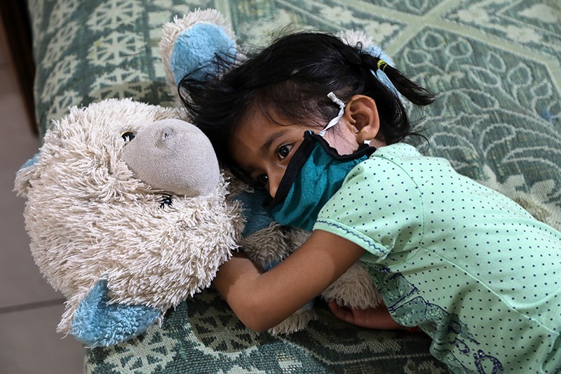An Indian orphan girl at Balgran charitable Orphanage home in Jammu, India during the pandemic.