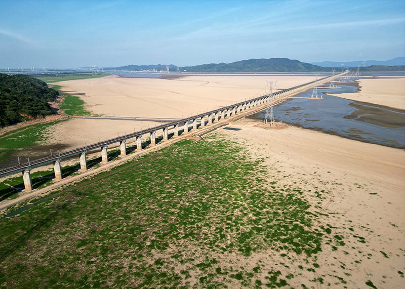 The lakebed of China's largest freshwater lake, Poyang, is exposed due to high temperatures and drought.