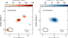 Carbon monoxide gas produced by a giant impact in the inner region of a young system