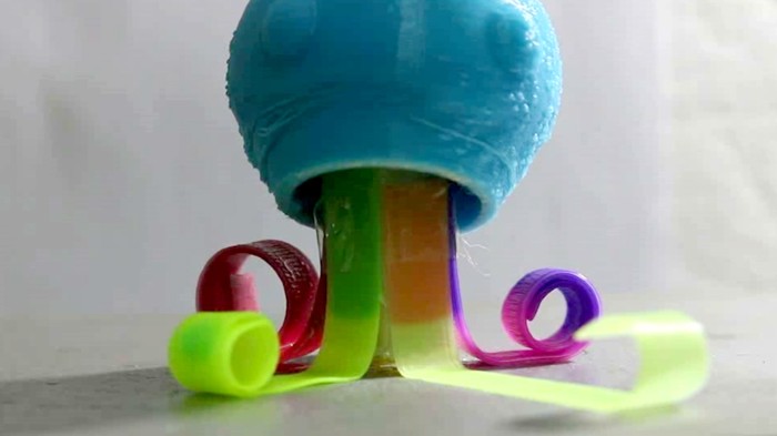 An artificial octopus with different coloured curled tentacles