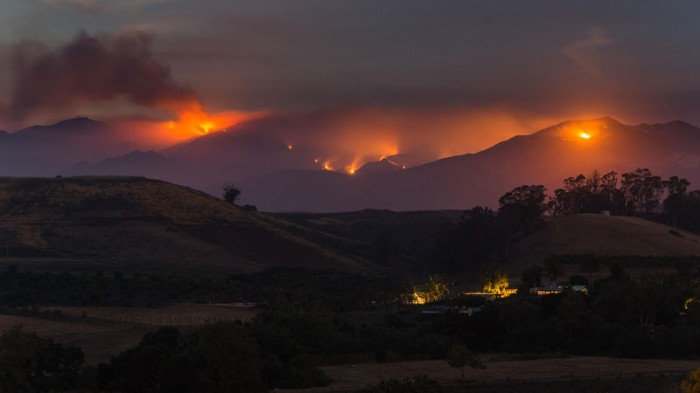 The Whittier Fire burns in the mountains above above Goleta, California.