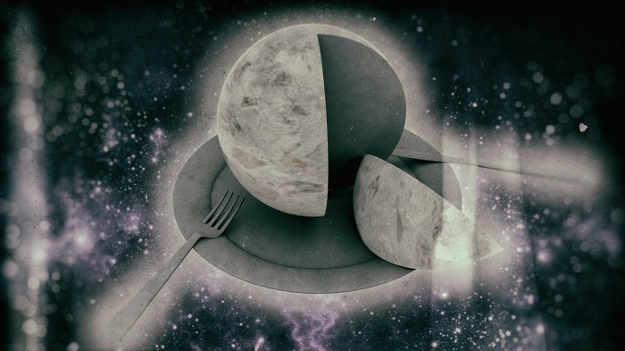 Artistic image of a grey planet with a slice cut of it sitting on a plate and surrounded by cutlery