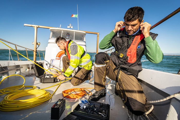 Underwater sound researchers on a boat in the North Adriatic Sea, Italy