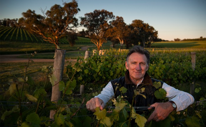 Geoff Gurr posing in a vineyard at sunset near Orange, Australia.