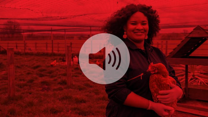 Doreen holding a chicken with a red overlay and speaker icon
