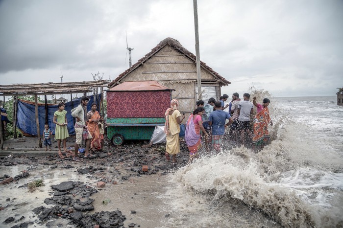 During high tide the coastal region of Namkhana Island in West Bengal, India is being damaged rapidly, as a hime is flooded.