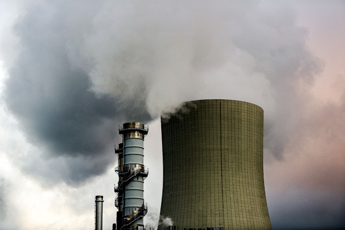 Steam comes out of a cooling tower of a gas-fired power plant in Lingen, Germany.