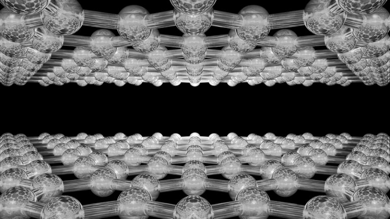Two layers of graphene showing individual atoms.