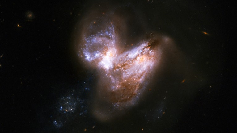 The system known as Arp 299 which consists of a pair of galaxies