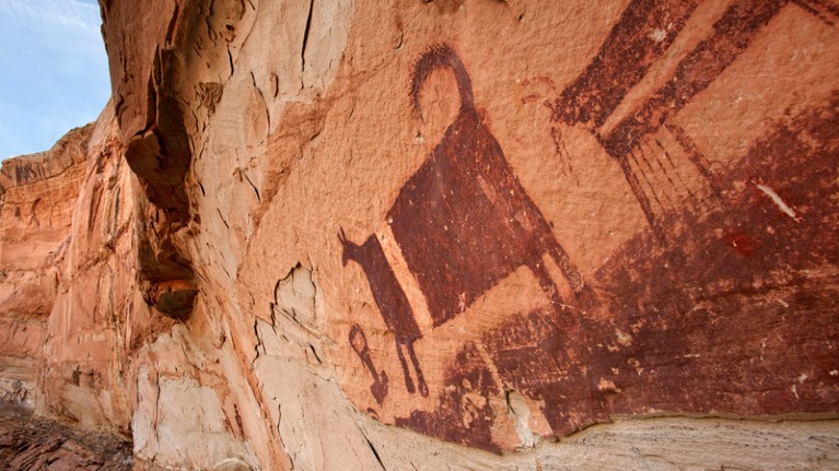 Ancient pictograph of a domestic dog un Sun Rafael Swell, Utah.