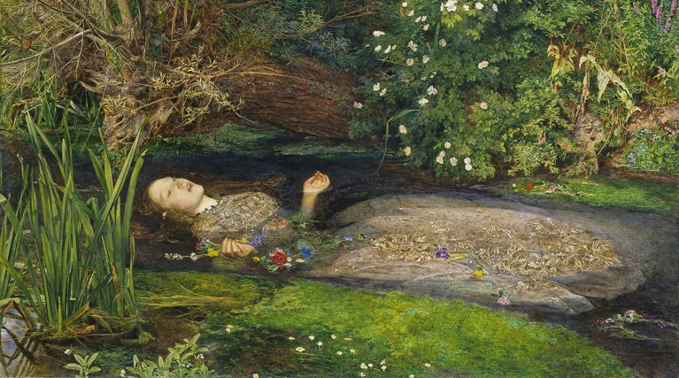 Painting of Ophelia lying in a stream among rushes and flowers by Sir John Everett Millais
