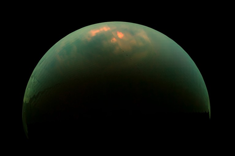 "Wet-sidewalk" effect on Titan