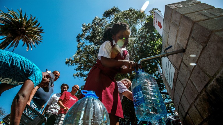 Cape Town residents queue to refill water bottles at Newlands Brewery Spring Water Point on Jan 30th 2018 in South Africa
