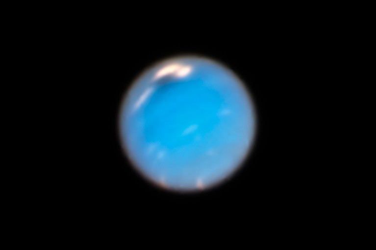 Hubble Telescope image of Neptune showing new dark storm spot