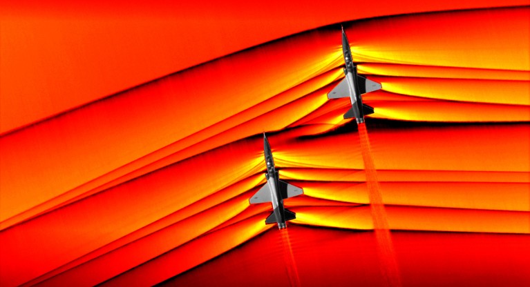 Shockwaves from a pair of T-38s from flying in formation at supersonic speeds.