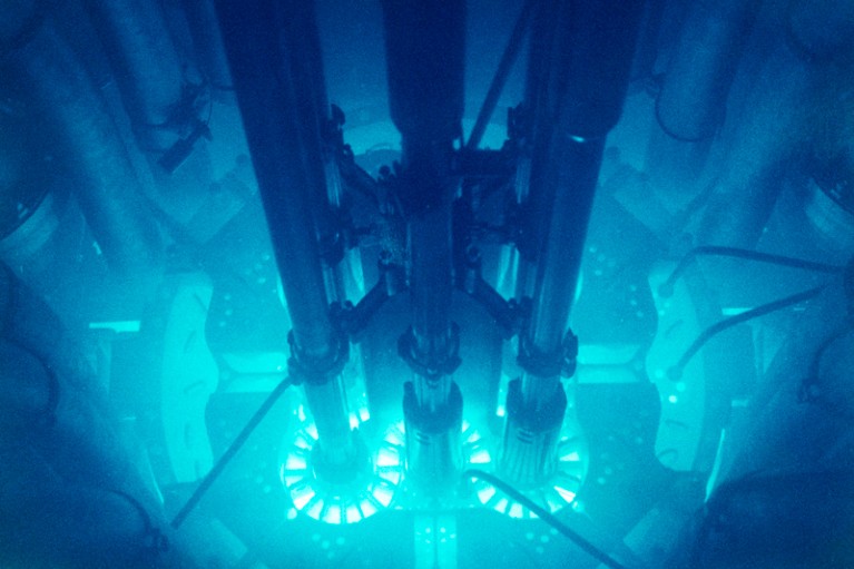 Nuclear reactor core glows blue due to Cherenkov radiation