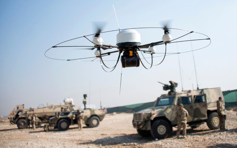 A Mikado drone of the Bundeswehr flies during a show of German soldiers at Camp Marmal in Mazar-e-Sharif