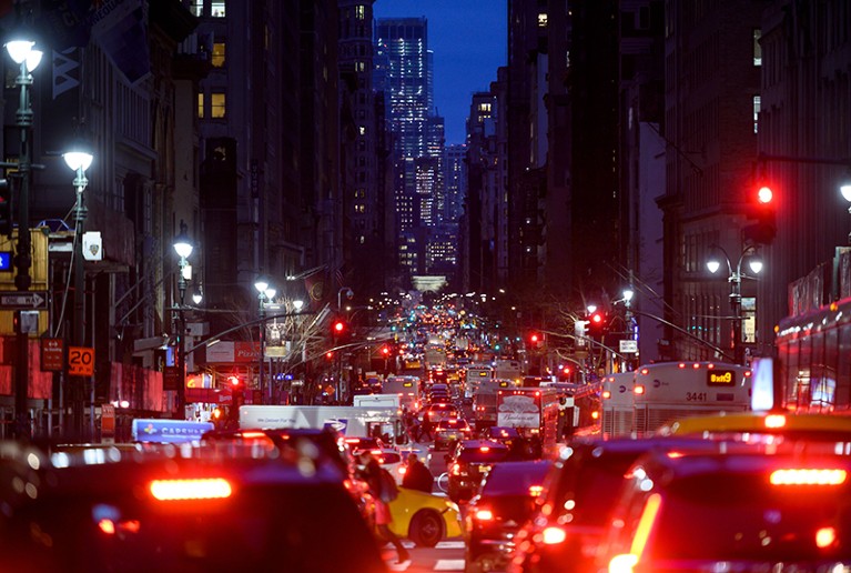 Cars are seen in a traffic jam in their evening commute on the 5th Avenue, New York