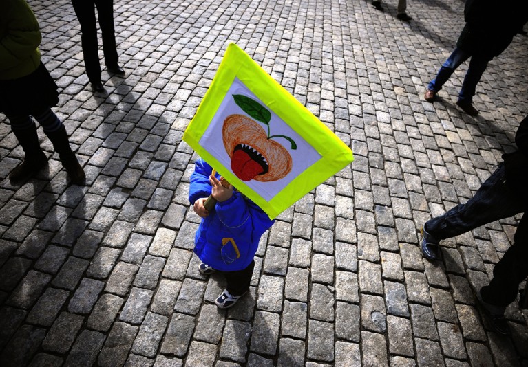 A child holds a sign during a demonstration against genetically modified organisms in Sofia, Bulgaria