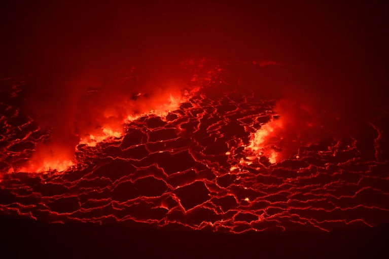 Lava is seen glowing inside the crater of the Nyiragongo volcano in the Democratic Republic of Congo