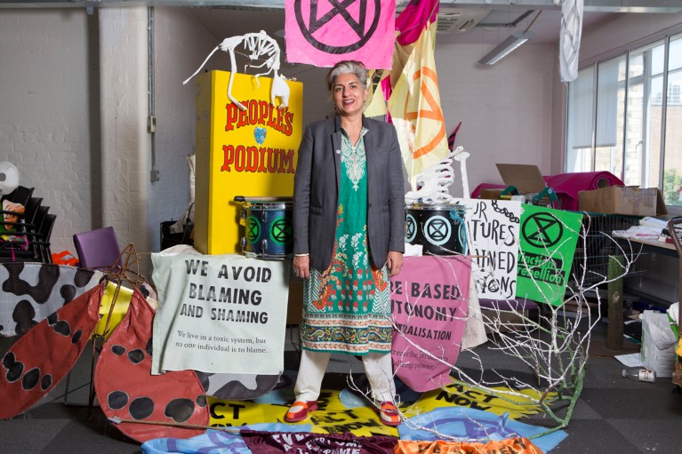 Farhana Yamin posing for a portrait at the Extinction Rebellion offices in London