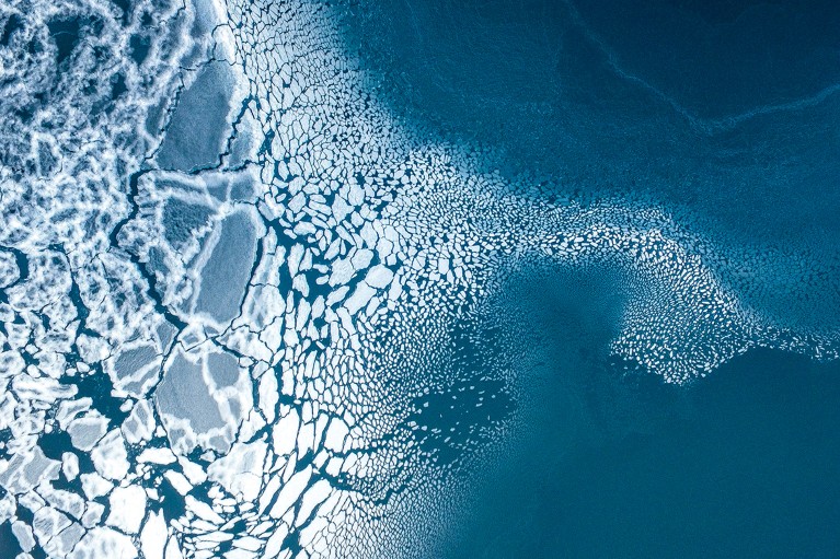 Arctic landscape of ice breaking off into the sea