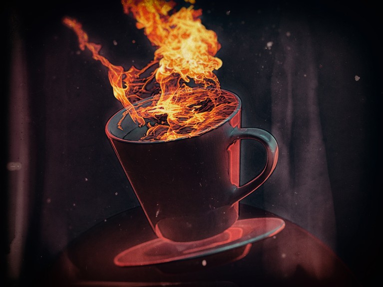 Artistic image of a teacup with fire coming out of it