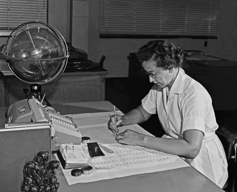 Katherine Johnson is photographed working at her desk at NASA Langley Research Centre in 1962