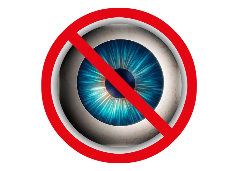 Artistic image of a blue iris with a no entry sign superimposed on top of it