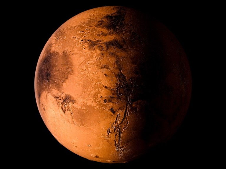 3D rendering of the planet Mars on a black background. Elements of the image furnished by NASA.