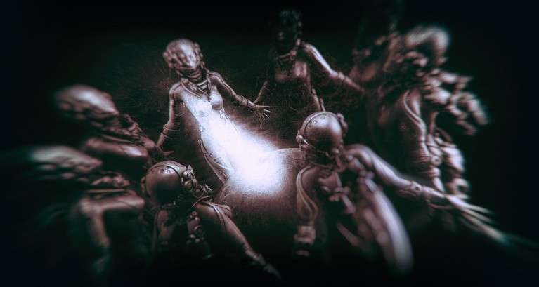 A white light is surrounded by a circle of figures wearing spacesuits