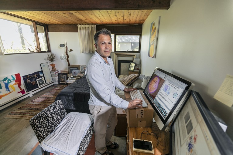 Hector Aguilar-Carreno, an immunologist at Cornell University, working from home during the pandemic