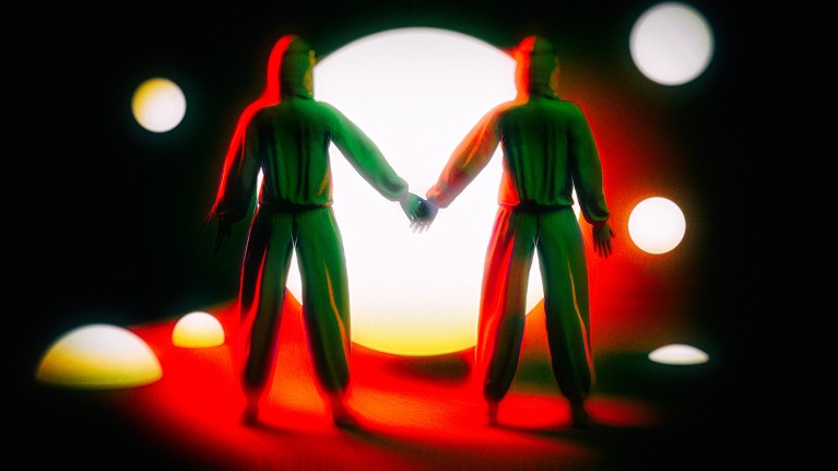 Two identically dressed figures hold hands and face a glowing circle of light