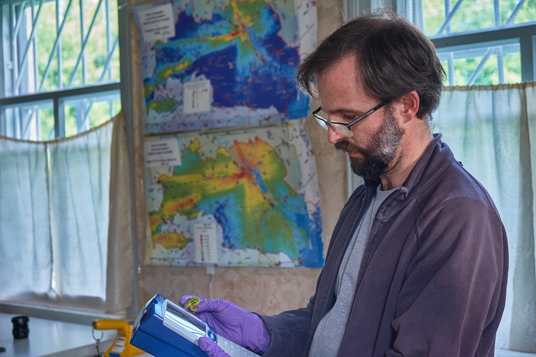 Germán Orizaola in an old house used as a field laboratory in Chernobyl