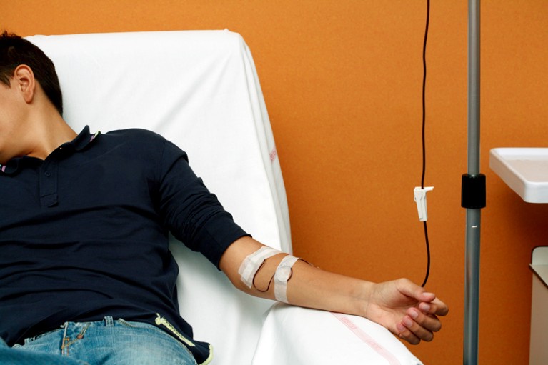 A man having a blood transfusion.