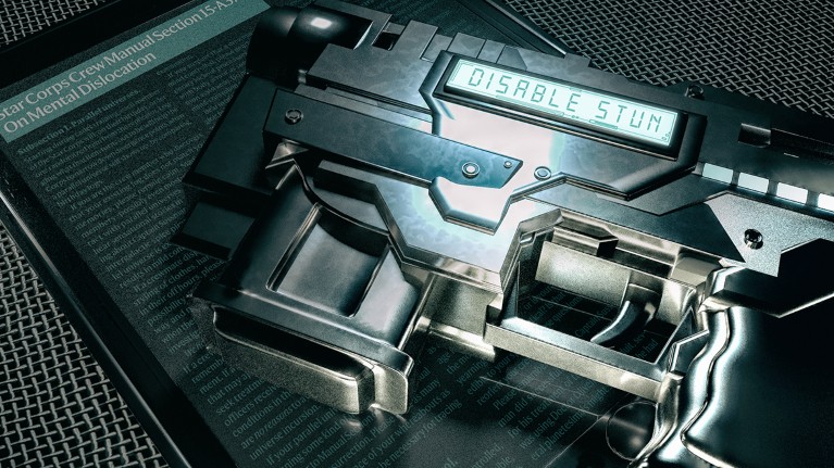 A futuristic guns lies on its side with an LED display that reads "Disable Stun"