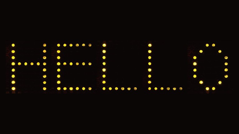 The word “HELLO” on an OLED display