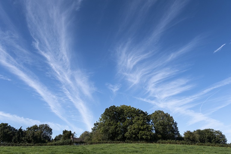 Cirrus cloud formations above a green landscape on 27th September 2020 near Wyre Forest in Callow Hill, United Kingdom.