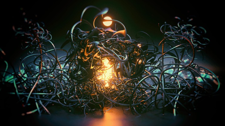 A glowing human figure crouches at the heart of a thick tangle of black wiring