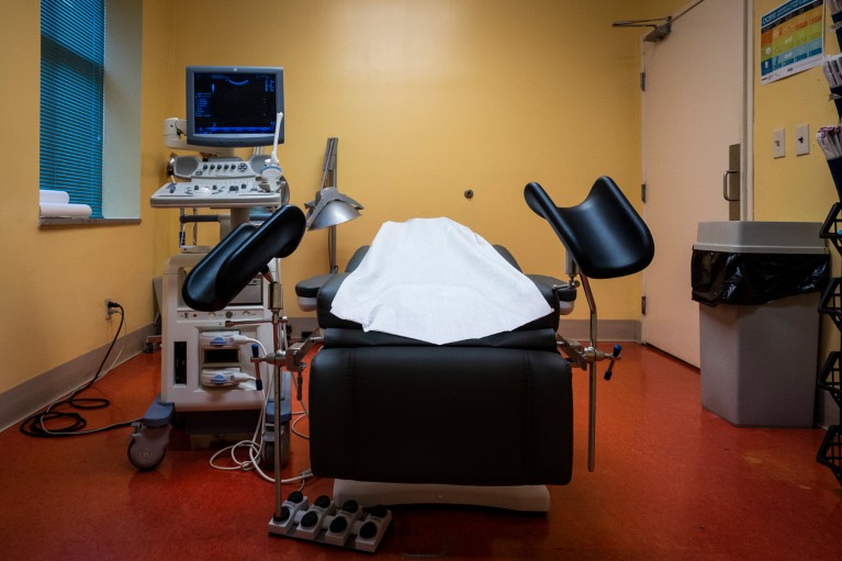An empty procedural room at an abortion clinic in Mississippi containing a bed with stirrups and an ultrasound machine