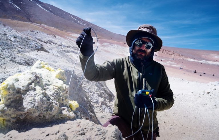 Gerdhard Jessen in the Atacama desert, South America, measuring the temperature of a fumarole.