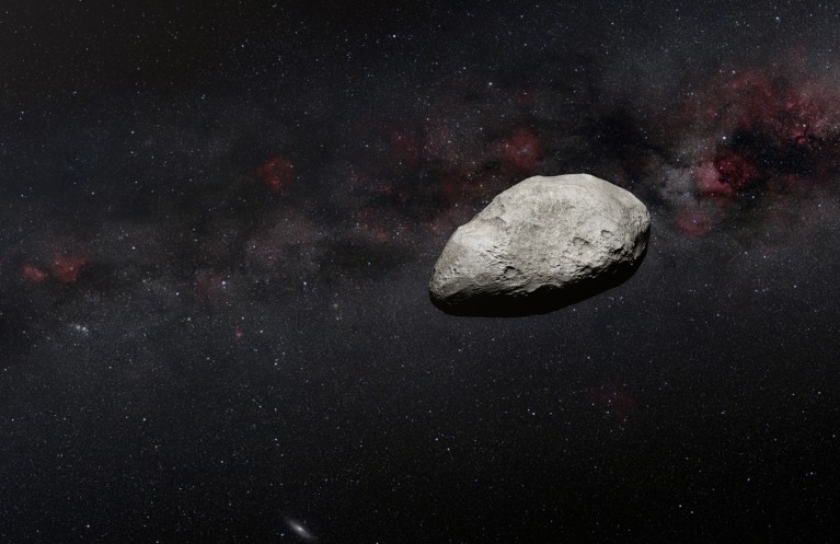 An artist's impression of a grey, irregularly-shaped asteroid against a dark background.