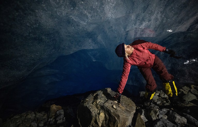 Glaciologist Andrea Fischer explores a natural glacier cavity of the Jamtalferner glacier, Austria.