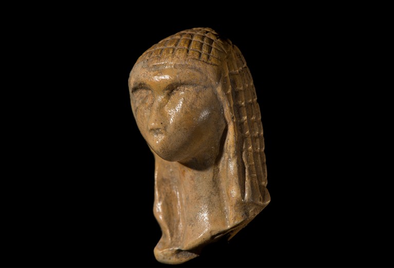 Resin replica of Venus of Brassempouy, a Stone Age figurine.