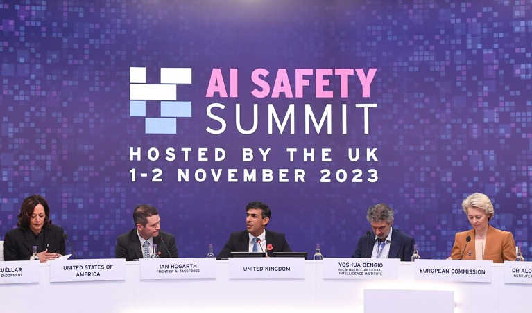 Rishi Sunak, UK prime minister, centre, prepares to host a plenary session during the AI Safety Summit 2023 at Bletchley Park.