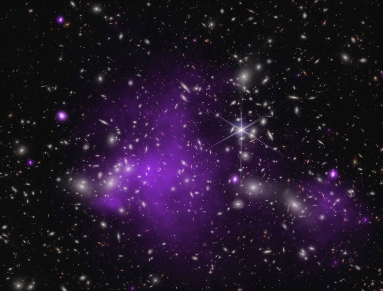 A huge star field with patches of purple in the centre.