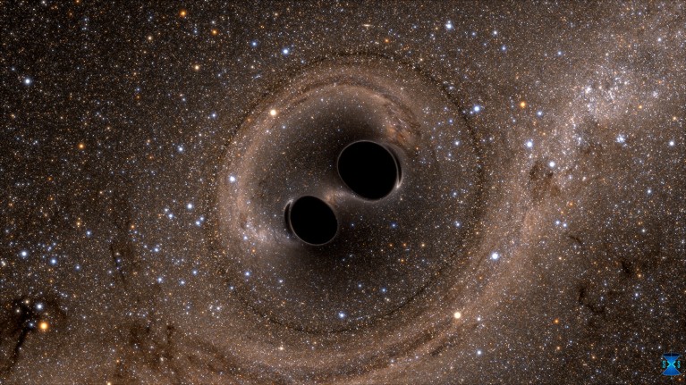 A computer simulation image showing the merger of two black holes.