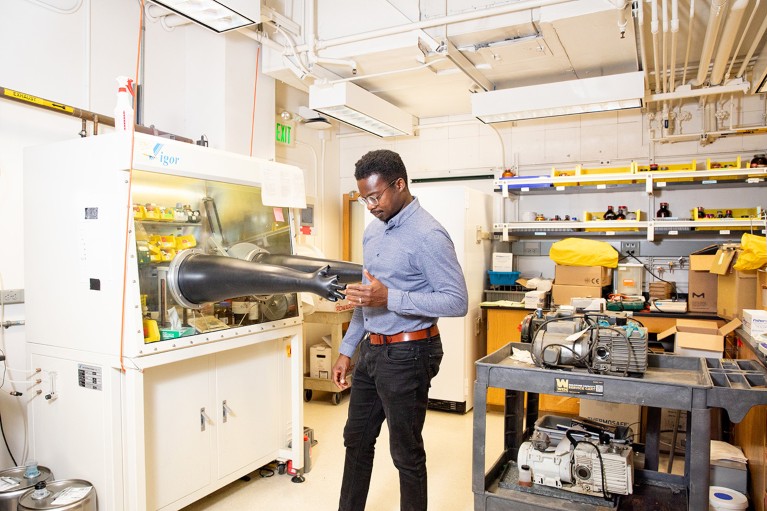 Richmond Sarpong preparing to work in a University of California, Berkeley chemistry laboratory.