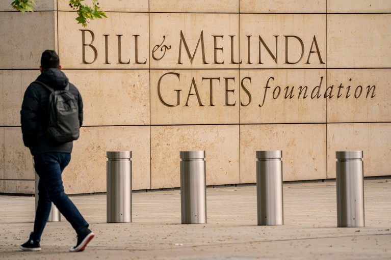 A pedestrian walks by the Bill and Melinda Gates Foundation headquarters in Seattle, Washington.