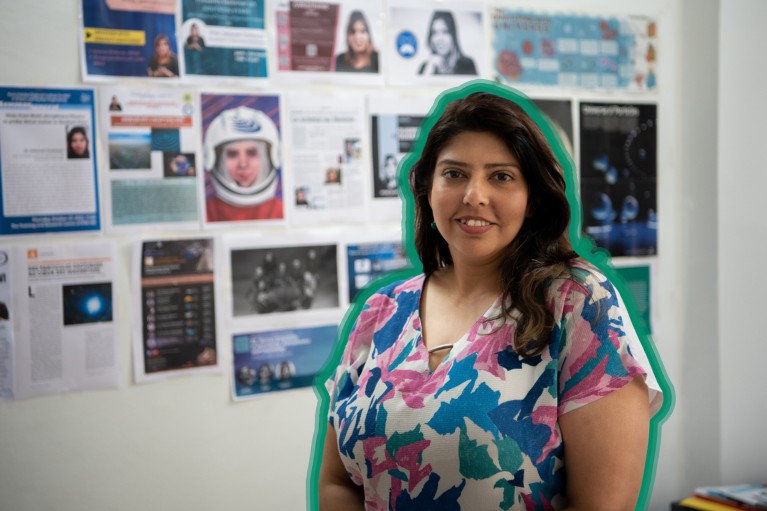 A portrait of Debarati Chatterjee, outlined in green, in an office